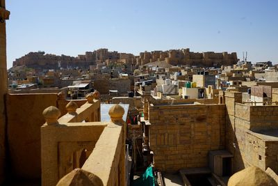 Panoramic view of buildings against clear sky