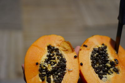 Close-up of orange slices on table