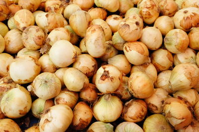 Full frame shot of onions for sale at market stall