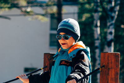Close-up of smiling boy wearing sunglasses