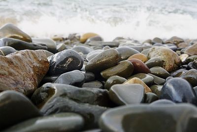 Close-up of stones on beach