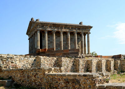 Low angle view of old ruin building against sky