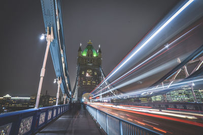 Light trails on bridge at night
