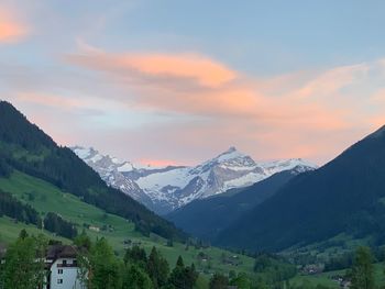 Scenic view of mountains against sky during sunset