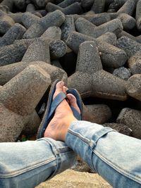 Low section of man on rock