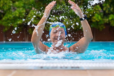 Portrait of woman in swimming pool