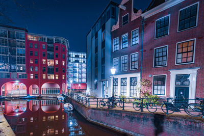 Illuminated buildings in city