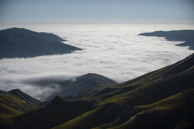 Scenic view of snowcapped mountains against sky