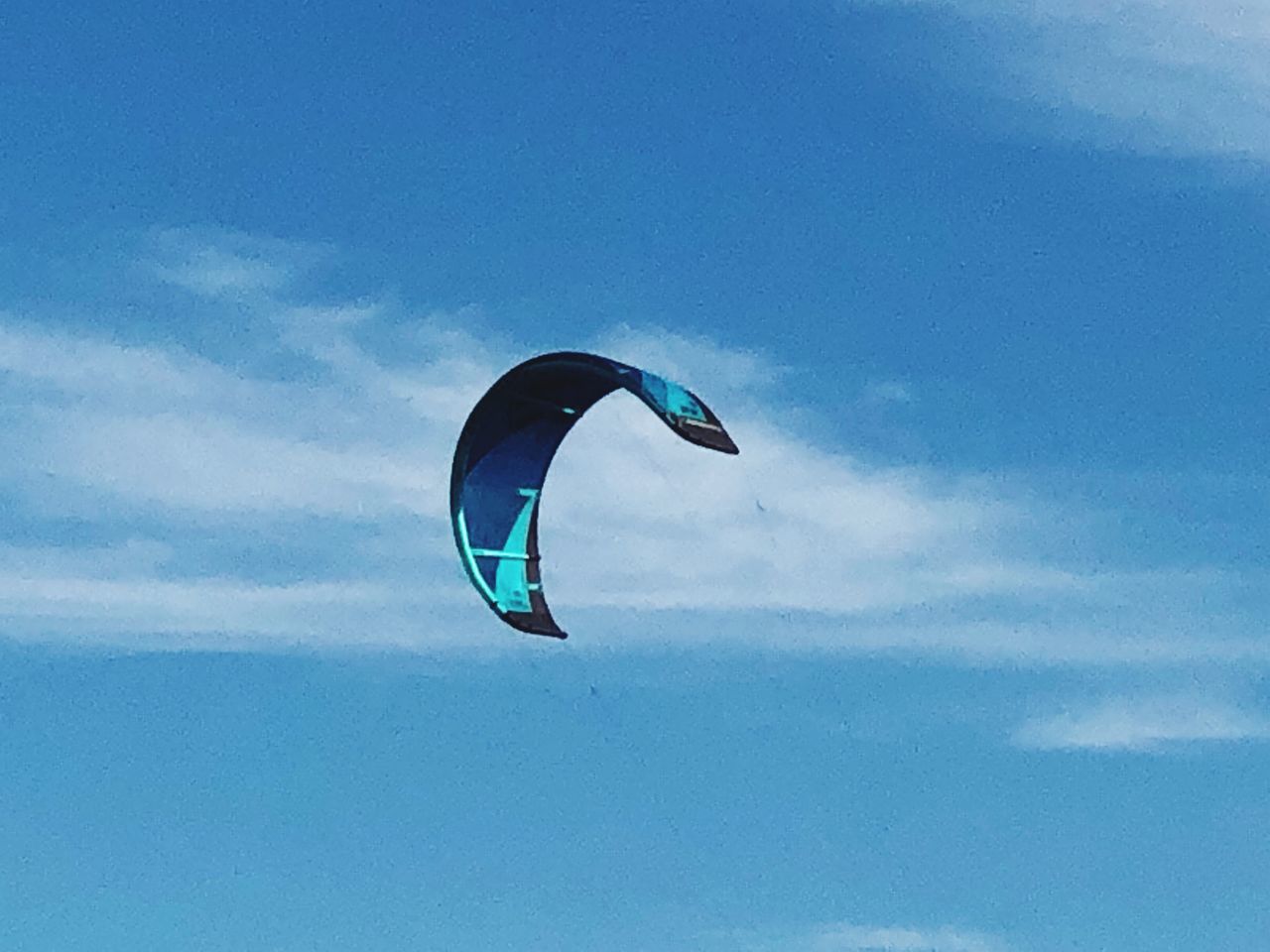 LOW ANGLE VIEW OF PARAGLIDING AGAINST SKY