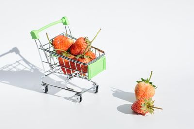 Close-up of fruits against white background