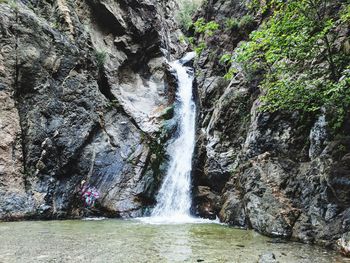 Scenic view of waterfall in forest