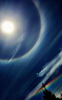 Low angle view of rainbow in sky