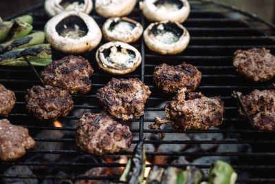 Close-up of meat on barbecue grill