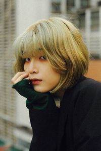 Portrait of teenage boy looking away