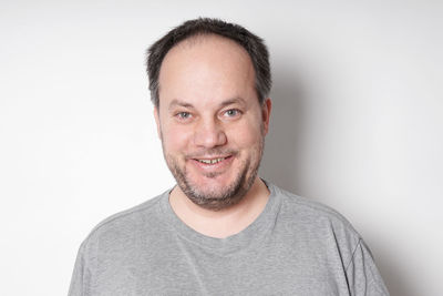 Portrait of man against white background