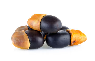 Close-up of oranges against white background