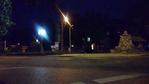 Illuminated street light at night