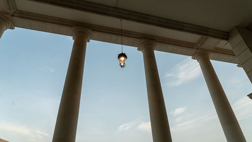 Low angle view of pillars against sky