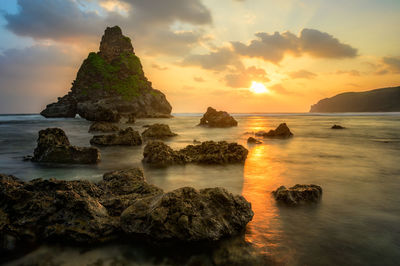 Scenic view of sea against sky during sunset