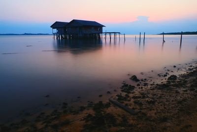 Scenic view of sea at sunset