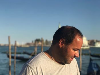 Man standing against sky at grand canal