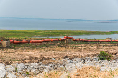 View of pipeline by sea