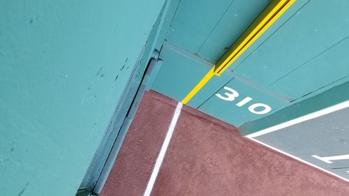 High angle view of information sign on wall