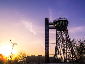 Low angle view of building against sky during sunset