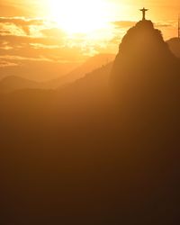 Scenic view of mountains at sunset