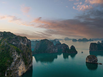 Dreamy sunset among the rocks of halong bay, vietnam