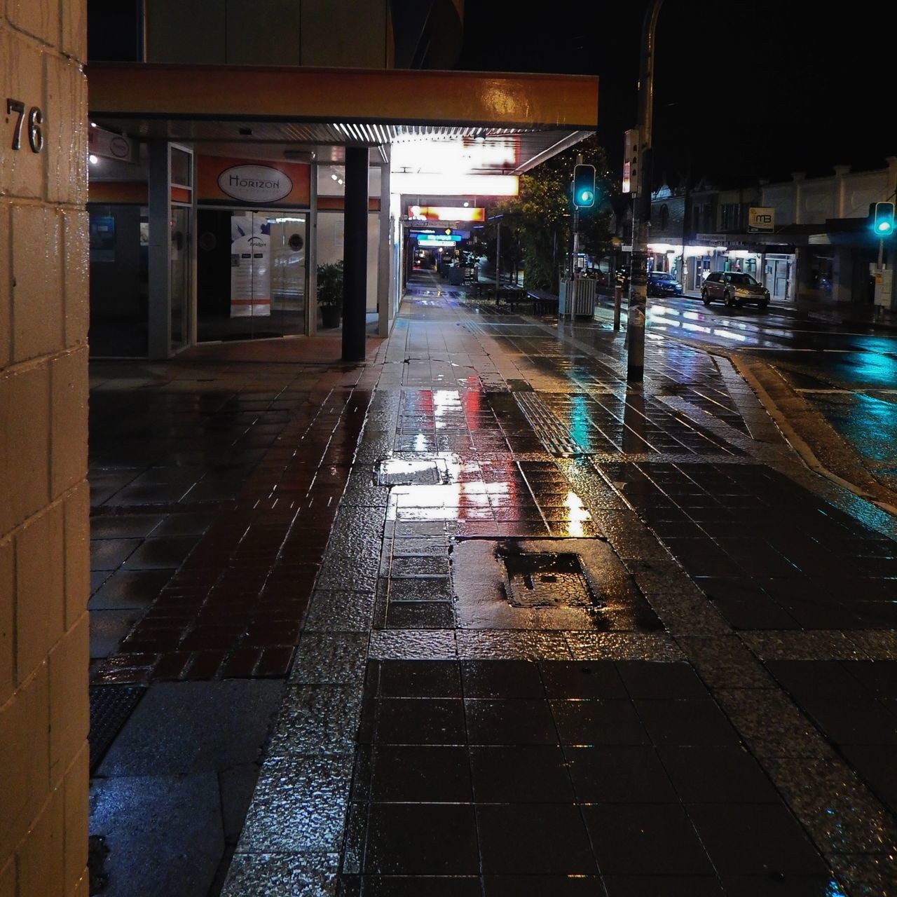 ILLUMINATED CITY STREET AT NIGHT