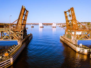 View of bridge over river against sky