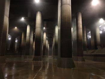 Illuminated lights on tiled floor in building