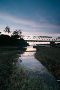 Bridge over river against sky