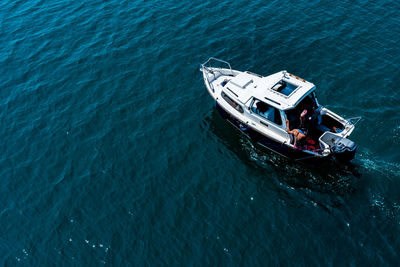 High angle view of boat sailing in sea