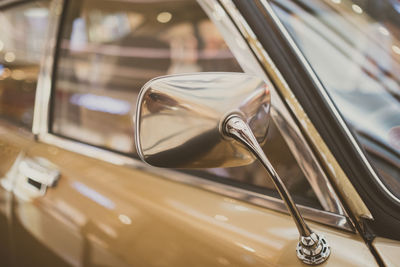 Close-up of vintage car on side-view mirror