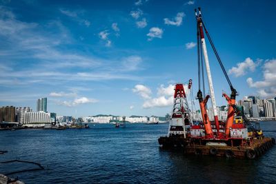 Offshore platform in sea against sky