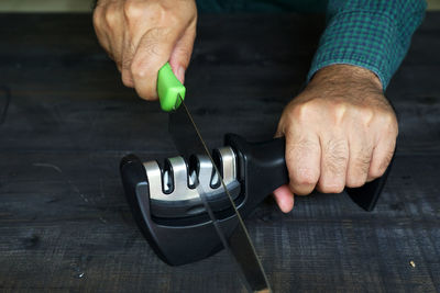 High angle view of man working on table