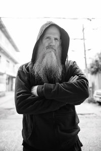 Midsection of man standing in winter