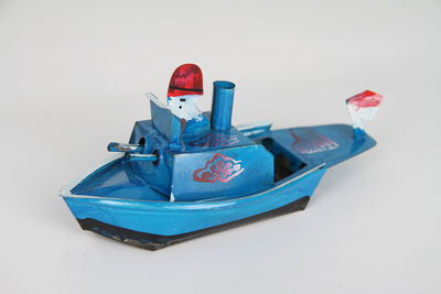 Close-up of toy over white background