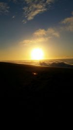 Scenic view of landscape at sunset