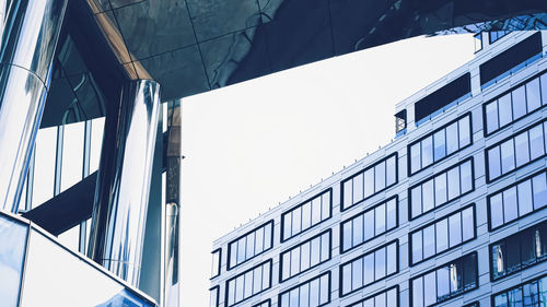 Low angle view of modern building against clear sky