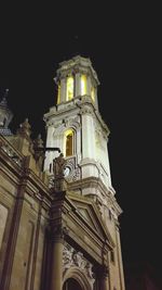 Low angle view of church against sky at night