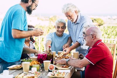 Group of people on table at beach