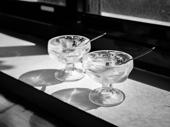 High angle view of wine glasses on table