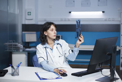 Female doctor working in laboratory