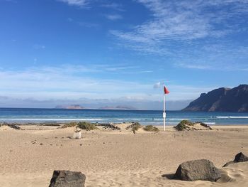Scenic view of beach against sky