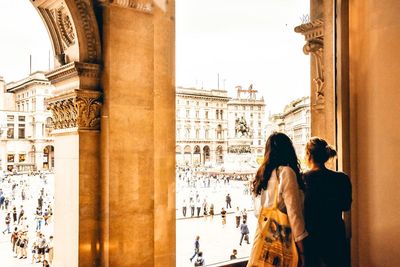 People in front of historical building