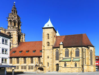 Low angle view of building against blue sky