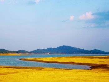 Scenic view of lake against sky